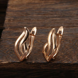 Rose Gold Color Hollow Glossy Flame Shape Latch Back Earring E5